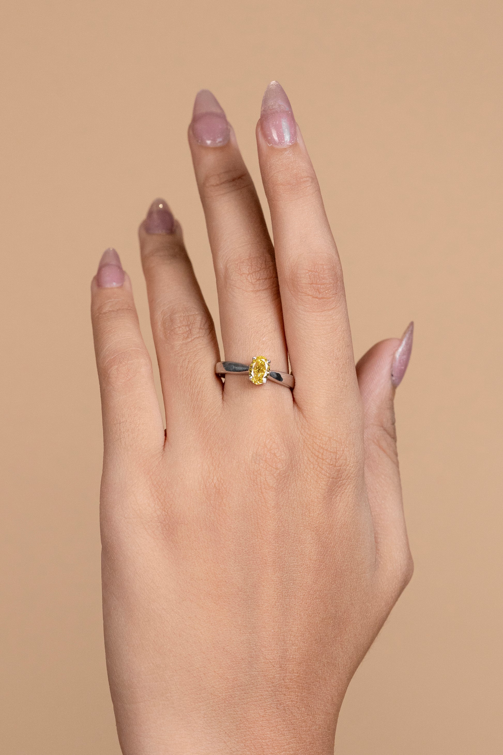 Oval Cut Solitaire Style Engagement Ring