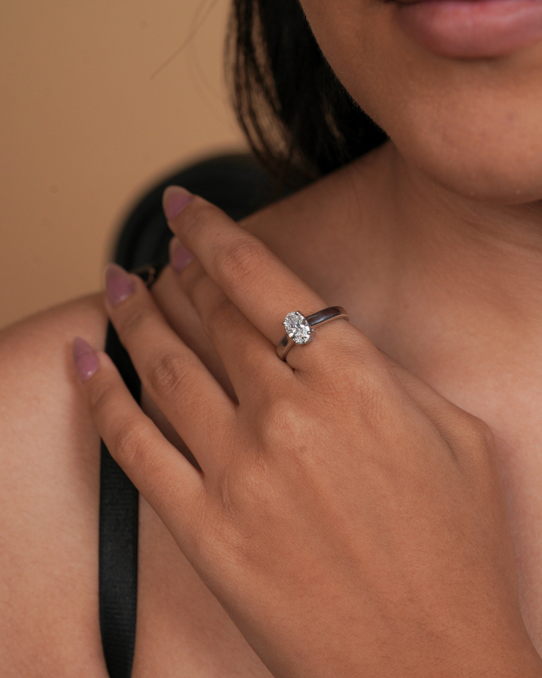 Oval Cut Solitaire Style Engagement Ring