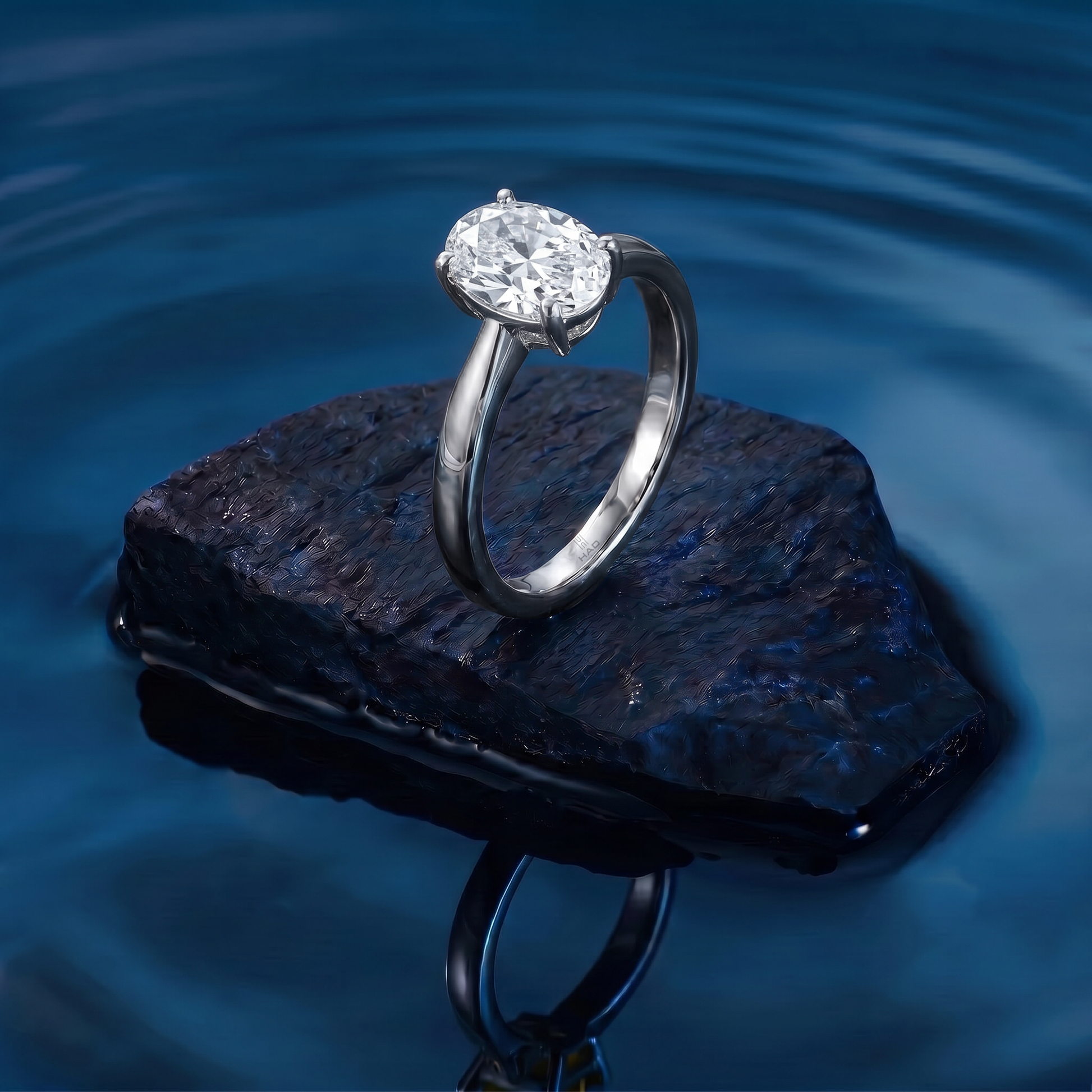 Oval Cut Solitaire Style Engagement Ring