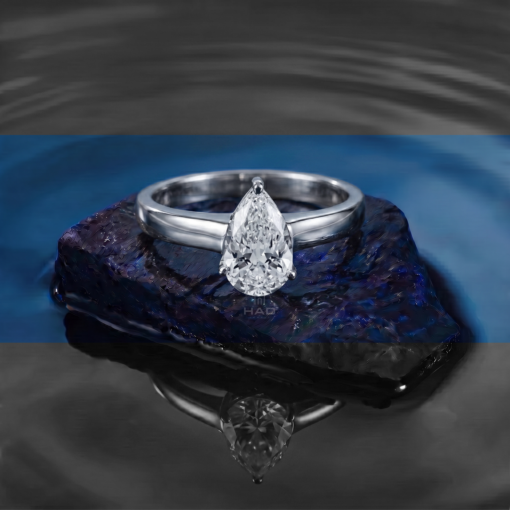 Pear Cut Solitaire Style Engagement Ring