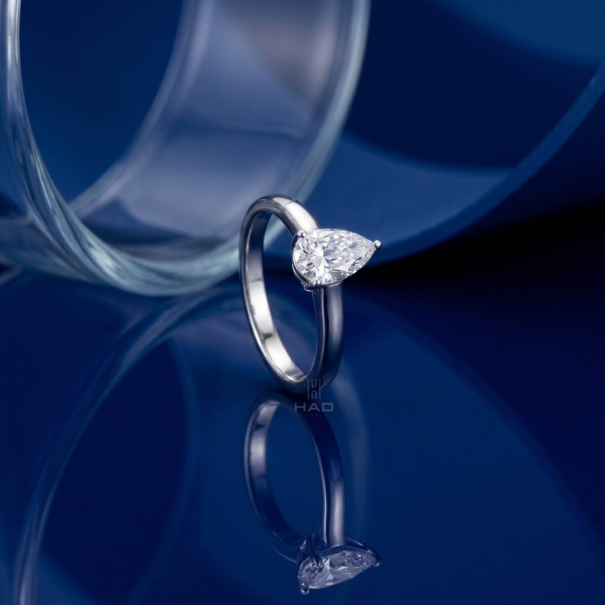 Pear Cut Solitaire Style Engagement Ring