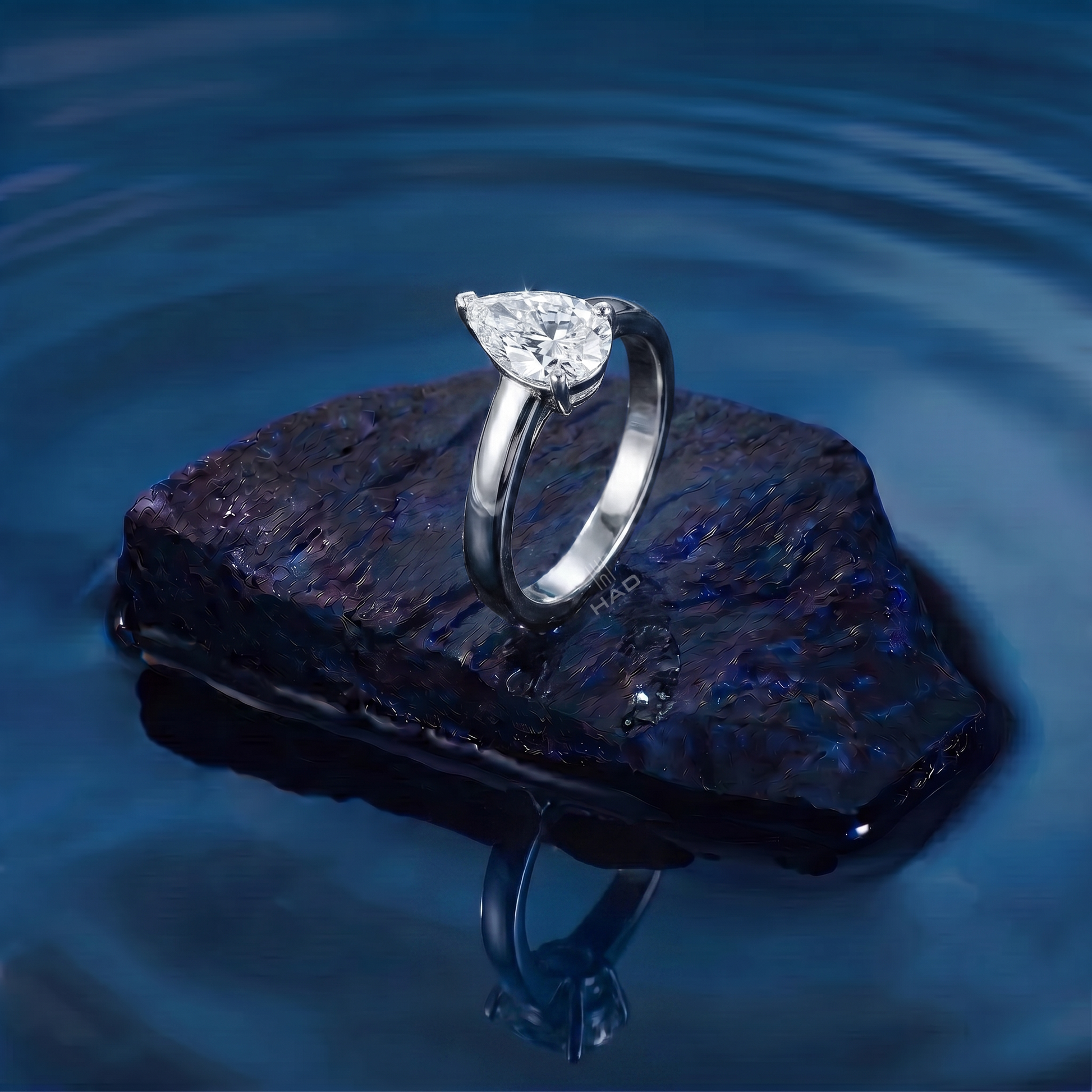 Pear Cut Solitaire Style Engagement Ring
