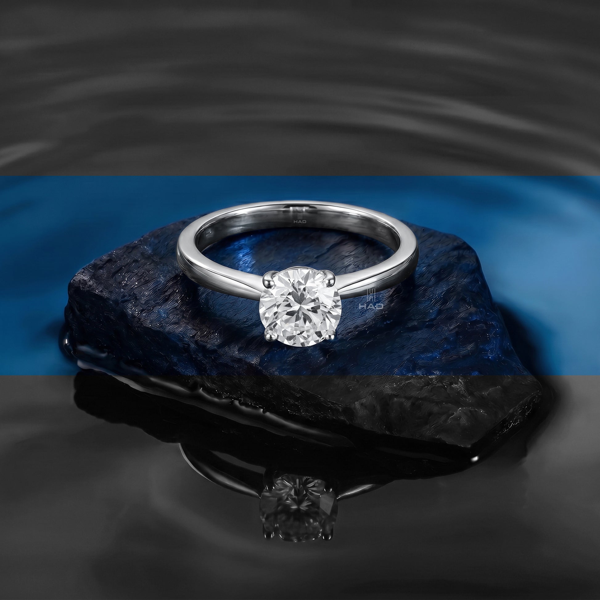 Round Cut Solitaire Style Engagement Ring